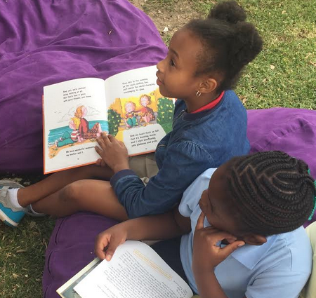 children reading at SMCC event